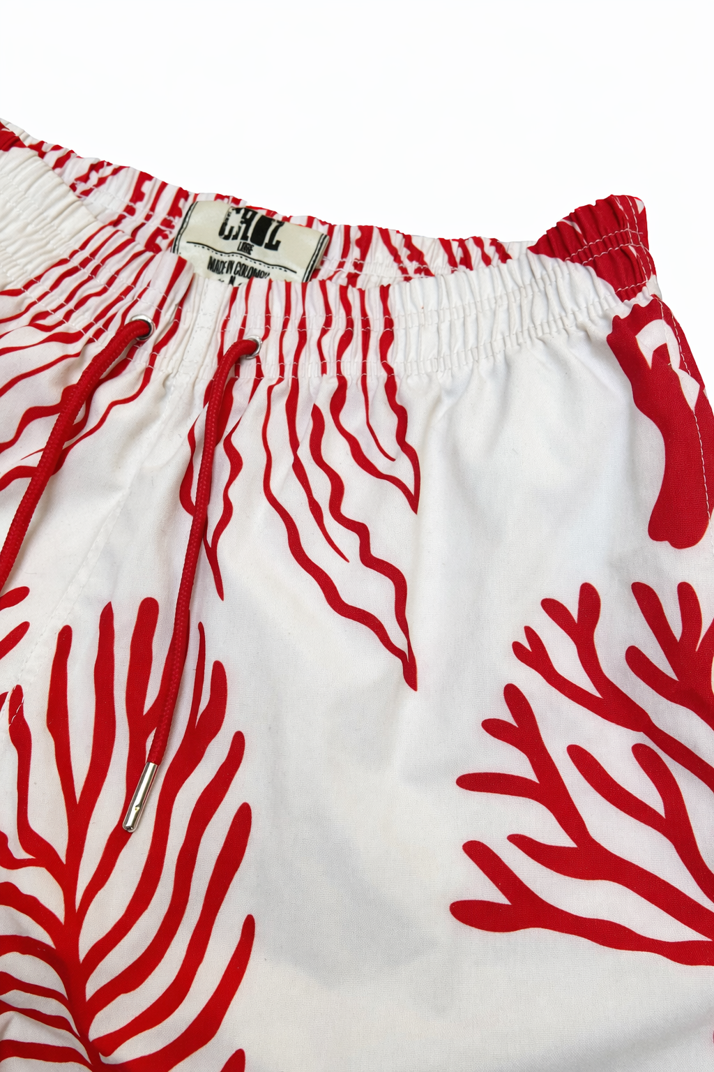 Pantaloneta playera beige coral