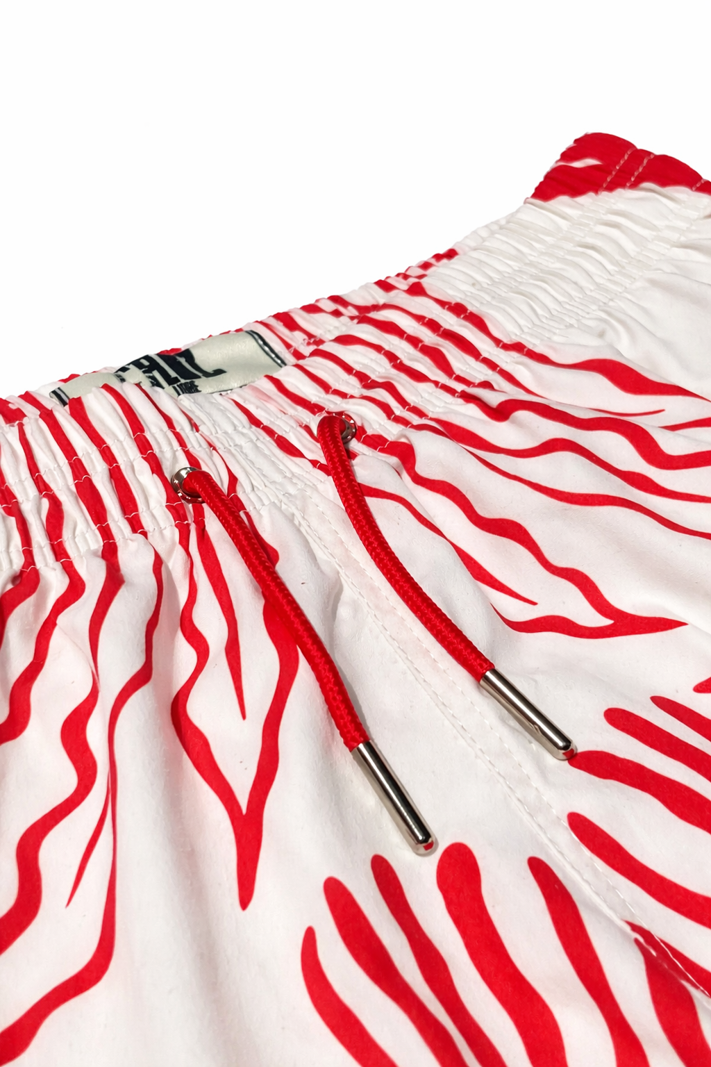 Pantaloneta playera beige coral