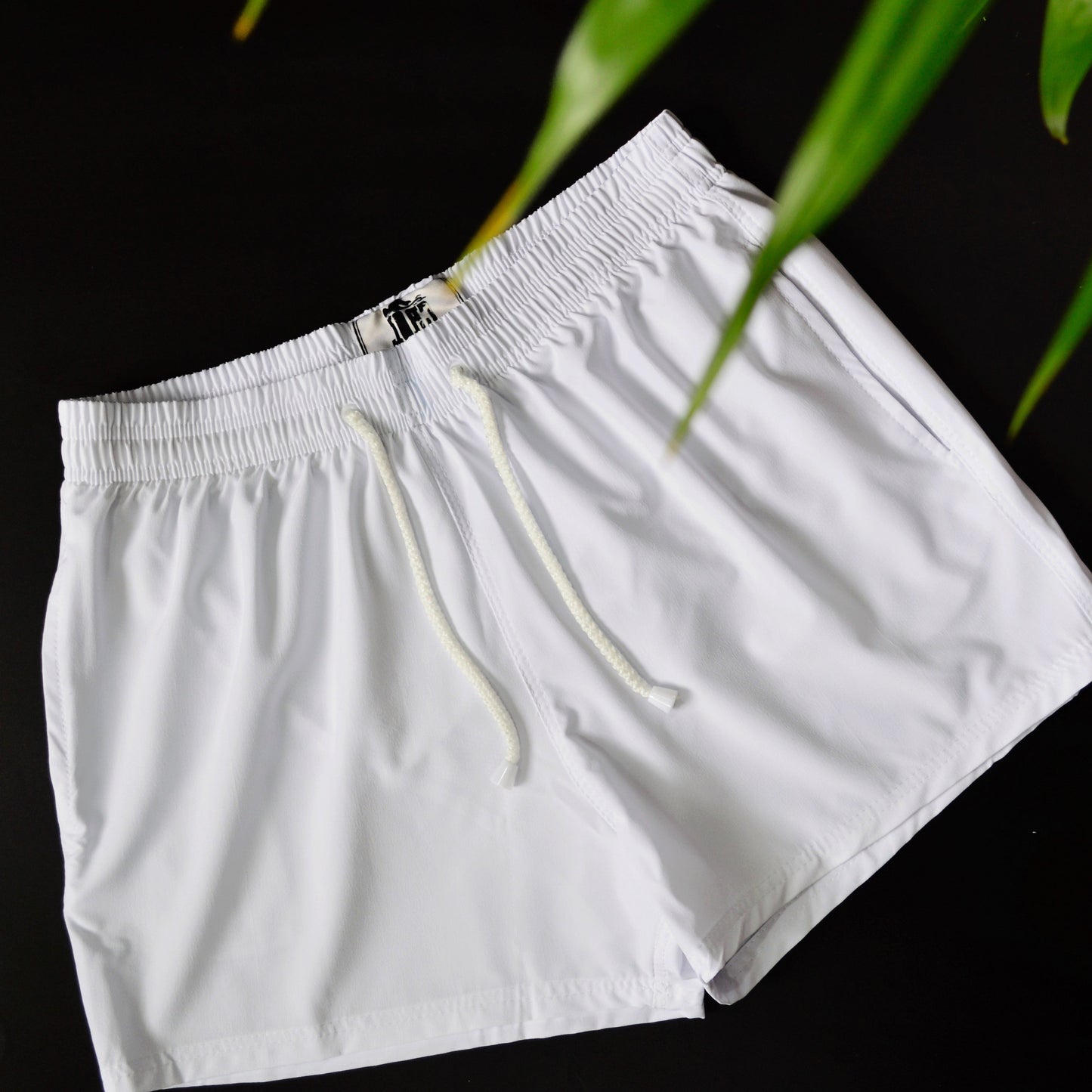 Pantaloneta playera Blanca de material rigido