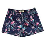 Pantaloneta azul noche con flores rosa
